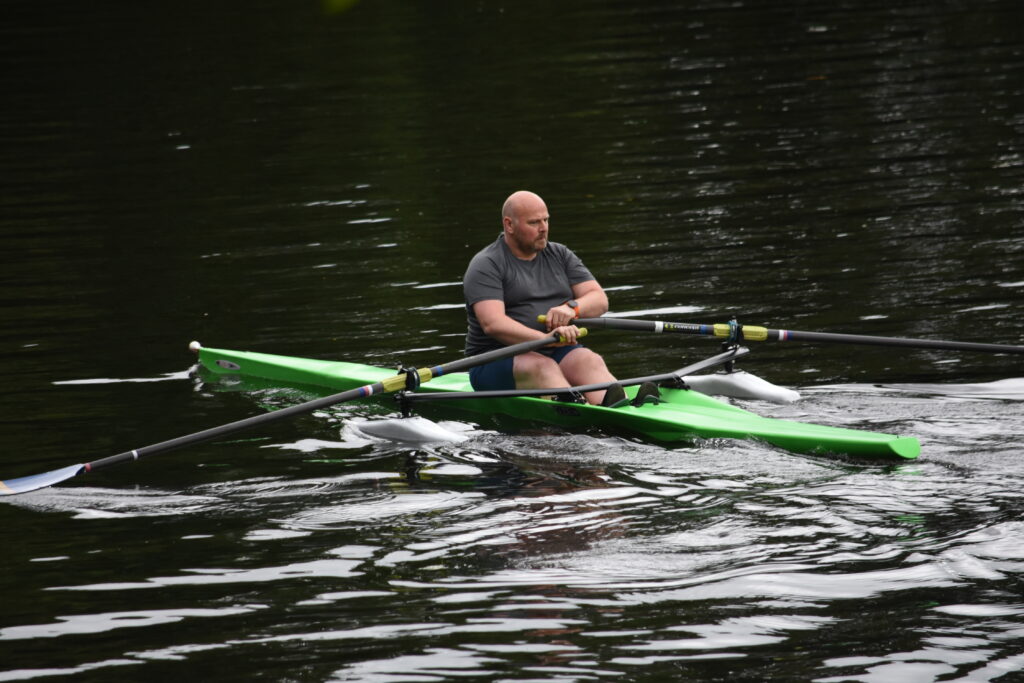 Adam trying out a Glide One single scull